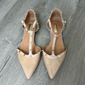 Halogen studded pointed toe flats
